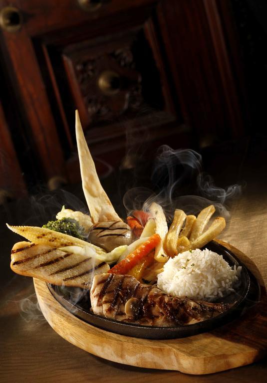 Heritage Мадурай Екстериор снимка A dish from the restaurant