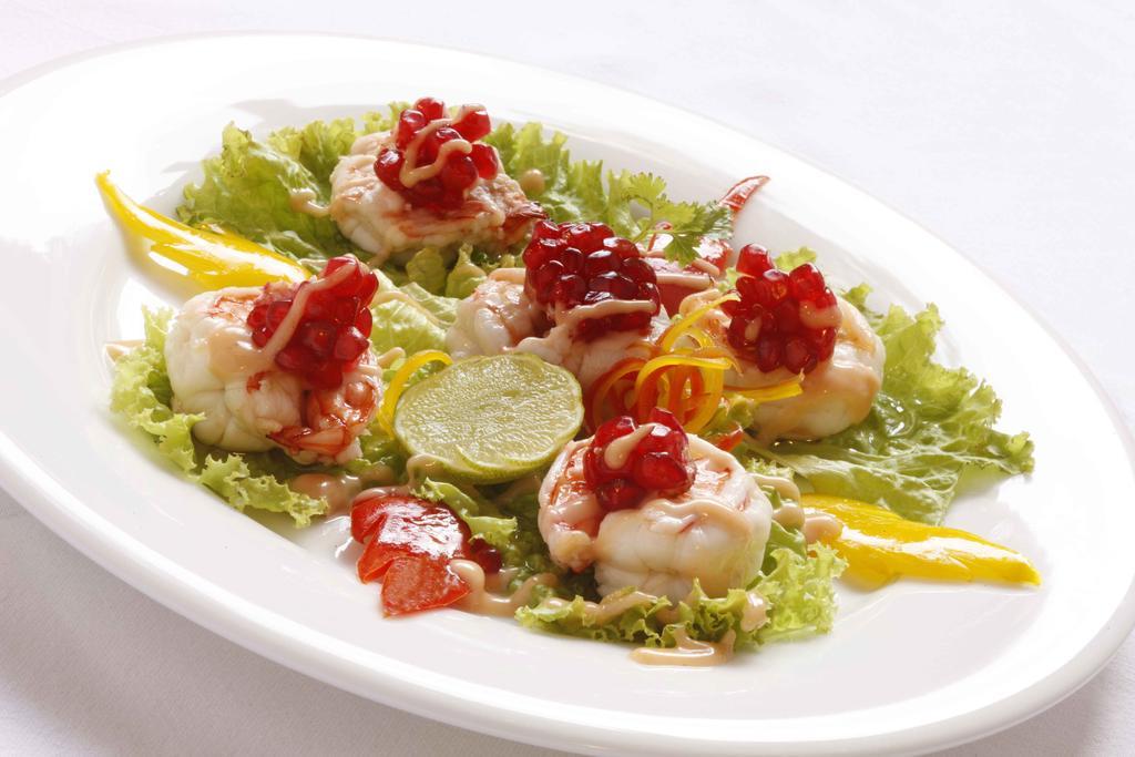 Heritage Мадурай Екстериор снимка A salad of scallops