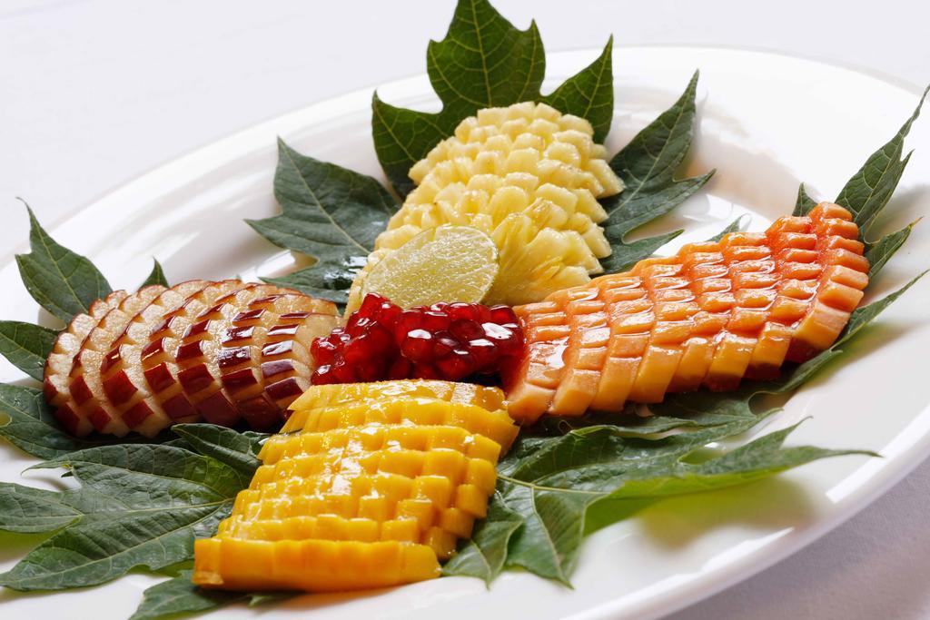 Heritage Мадурай Екстериор снимка A plate of sashimi
