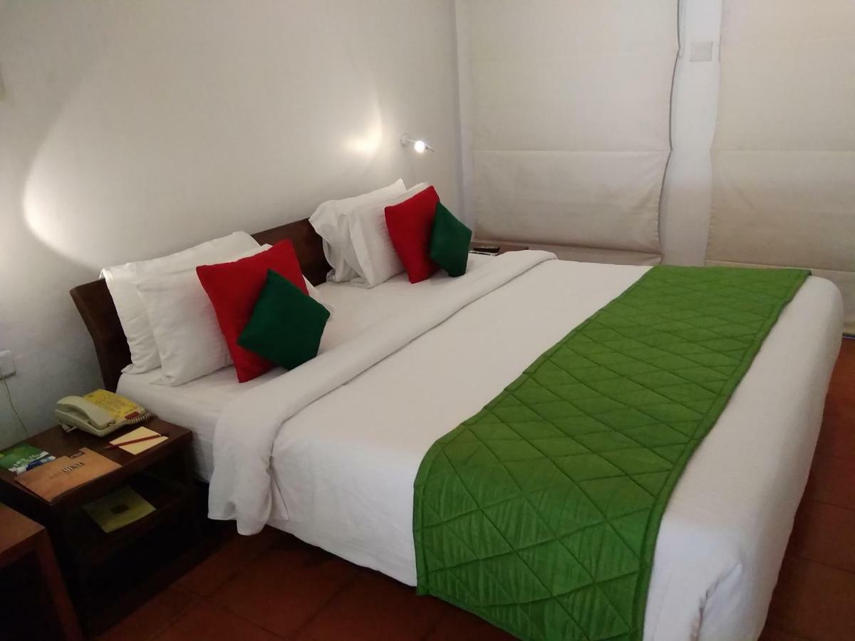 Heritage Мадурай Екстериор снимка A bed