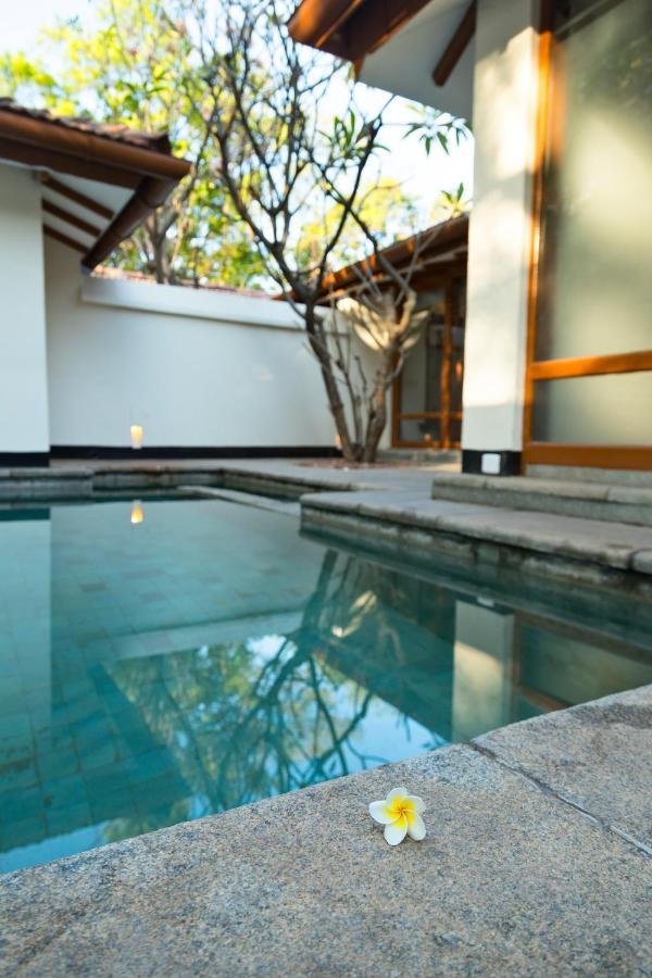 Heritage Мадурай Екстериор снимка A swimming pool at a private residence in Bangalore, India