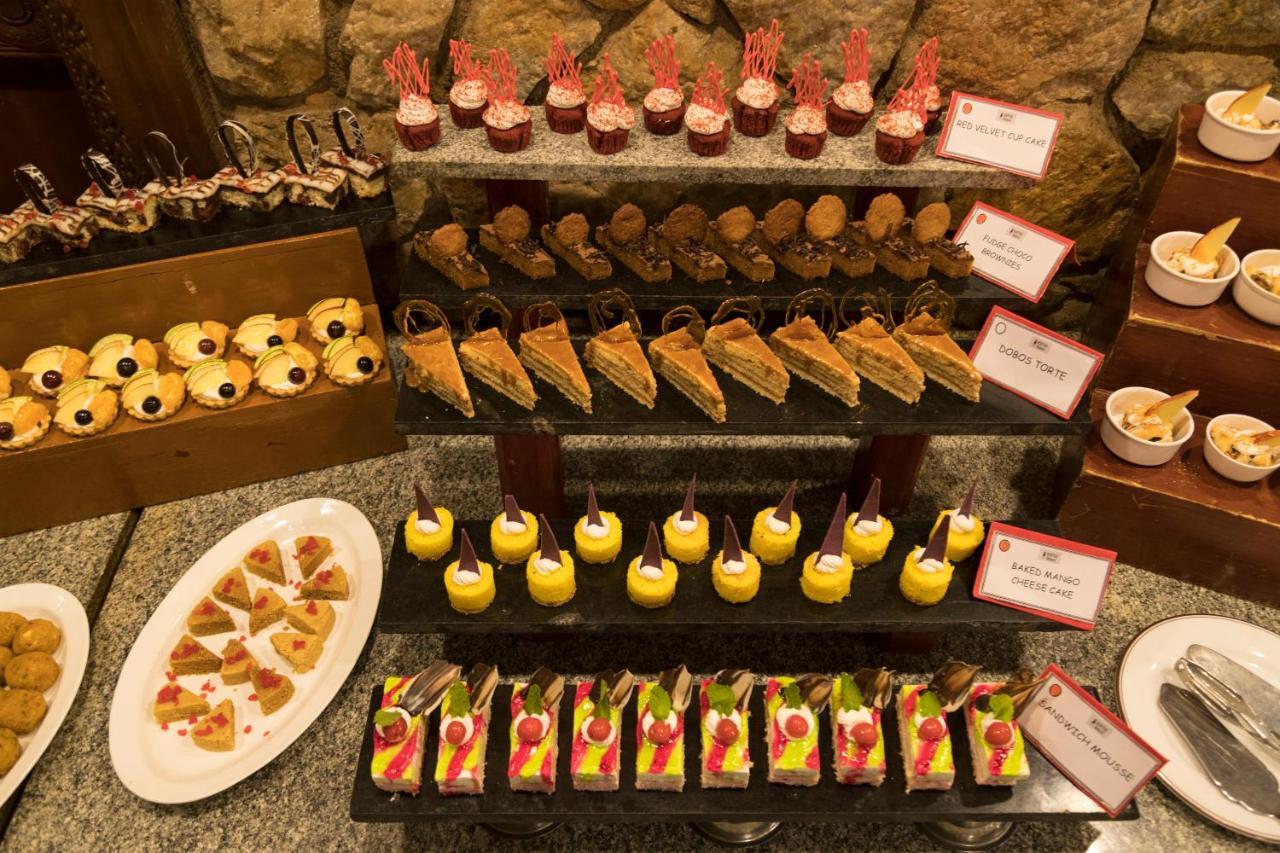 Heritage Мадурай Екстериор снимка A selection of desserts